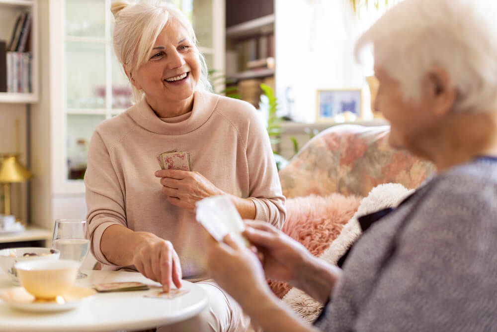A man in his independent senior living apartment